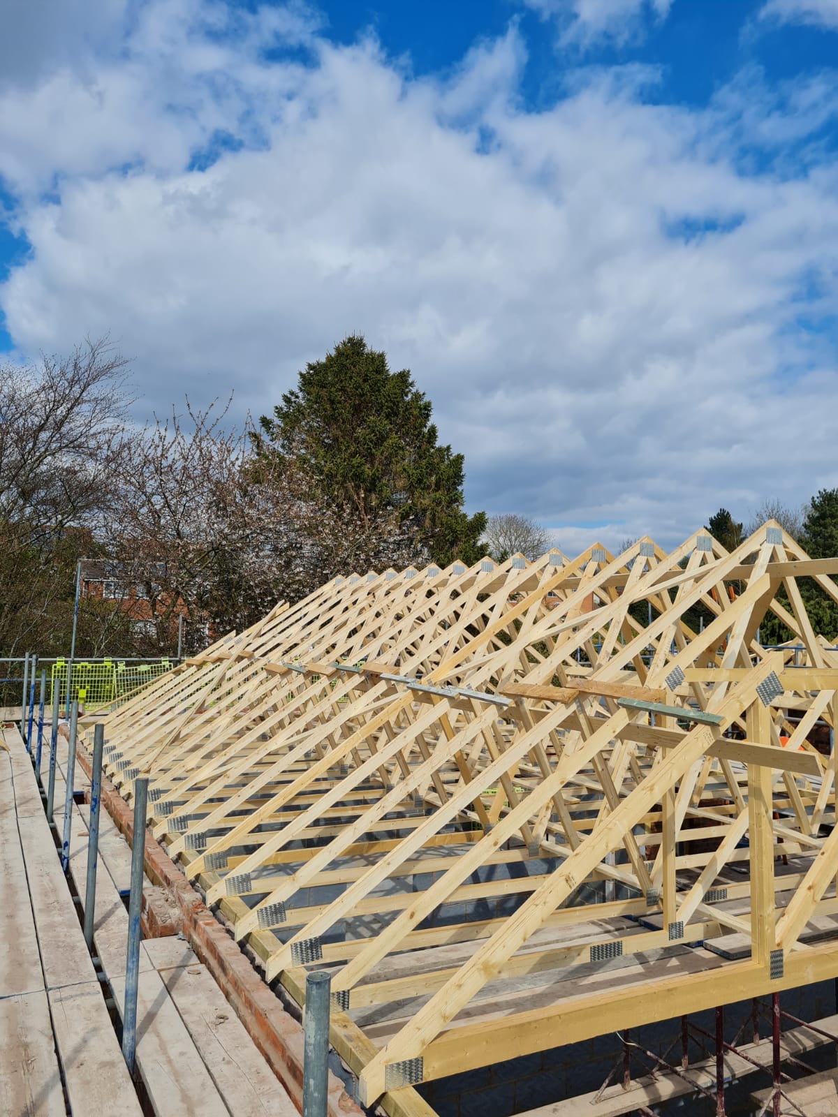 Roof trusses installed by EAB Construction during a property refurbishment project